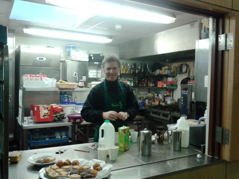 Alex Antelme, 45 year old barrister, making tea and coffee as he volunteersat Wandsworth Foodbank, St Mary's Church, south London. The number of people using food banks this Christmas has tripled compared to last year, according to a charity which runs 400 across the UK.