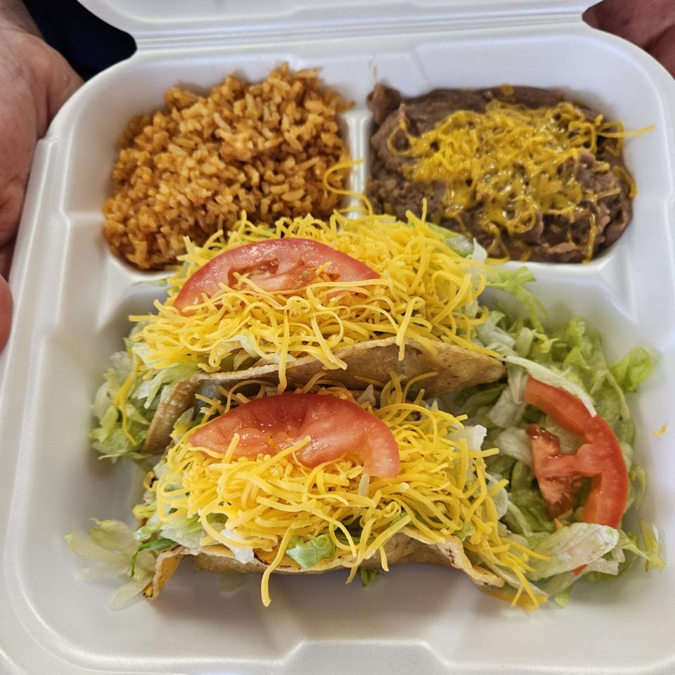 The No. 5 combo plate served with rice and beans is your choice of two tacos, chicken or beef or one of each.