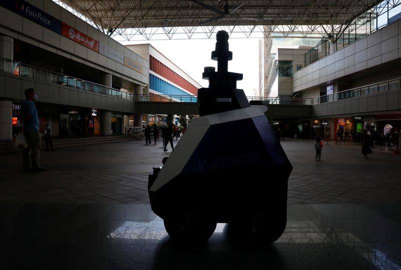 Autonomous robot Xavier patrols a neighbourhood mall to detect "undesirable social behaviours" during a three-week trial in Singapore