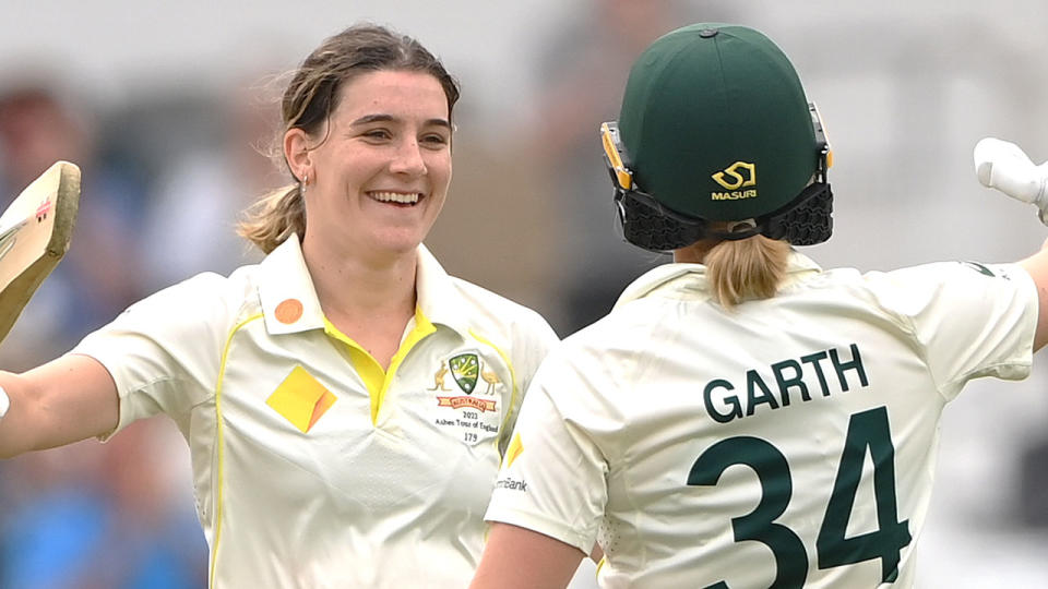 Pictured here, Annabel Sutherland celebrates her record-breaking century for Australia in the Ashes.