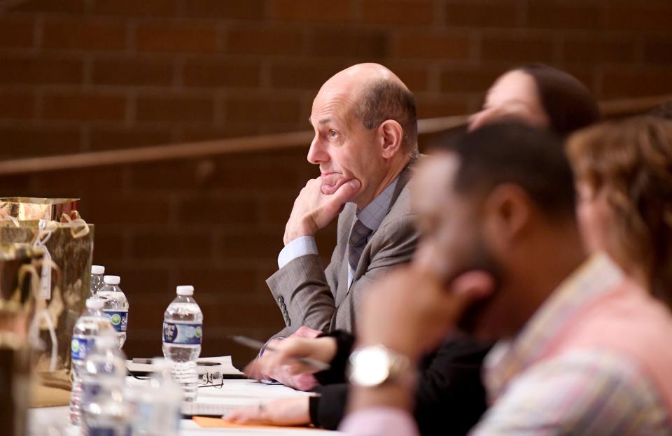 State Rep. Jim Thomas, R-Jackson Township, listens as a judge at the 2024 Miss Massillonian and Outstanding Senior Boy ceremony at Washington High School.