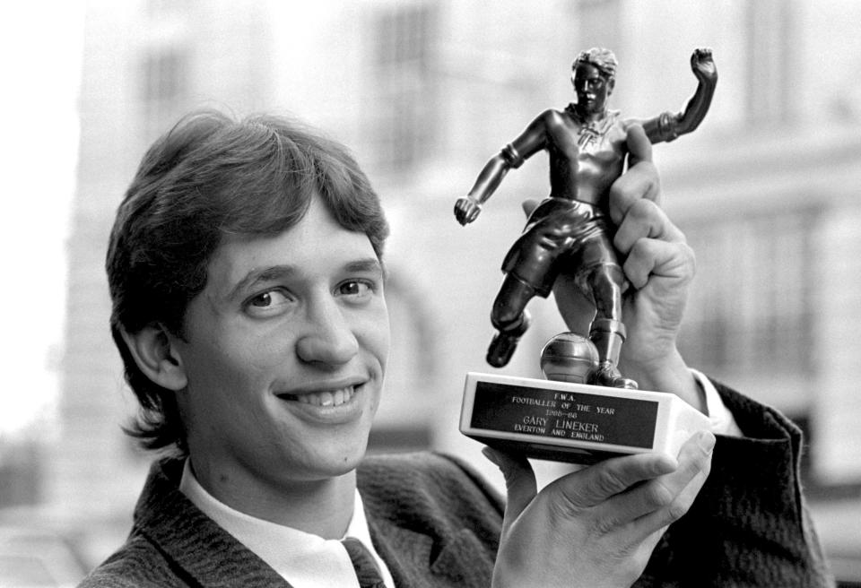 Everton's Gary Lineker shows off the Footballer of the Year trophy.