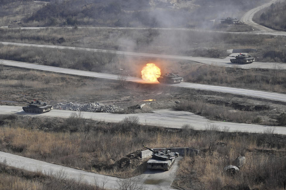 A South Korean K1A2 tank fires during a joint live fire exercise at a military training field in Pocheon Thursday, March 14, 2024, as part of the annual Freedom Shield joint military exercise between South Korea and the United States. (Jung Yeon-je /Pool Photo via AP)