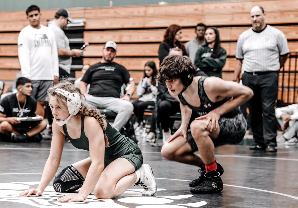 It is not uncommon for Venice High's Milana Borrelli to wrestle boys.