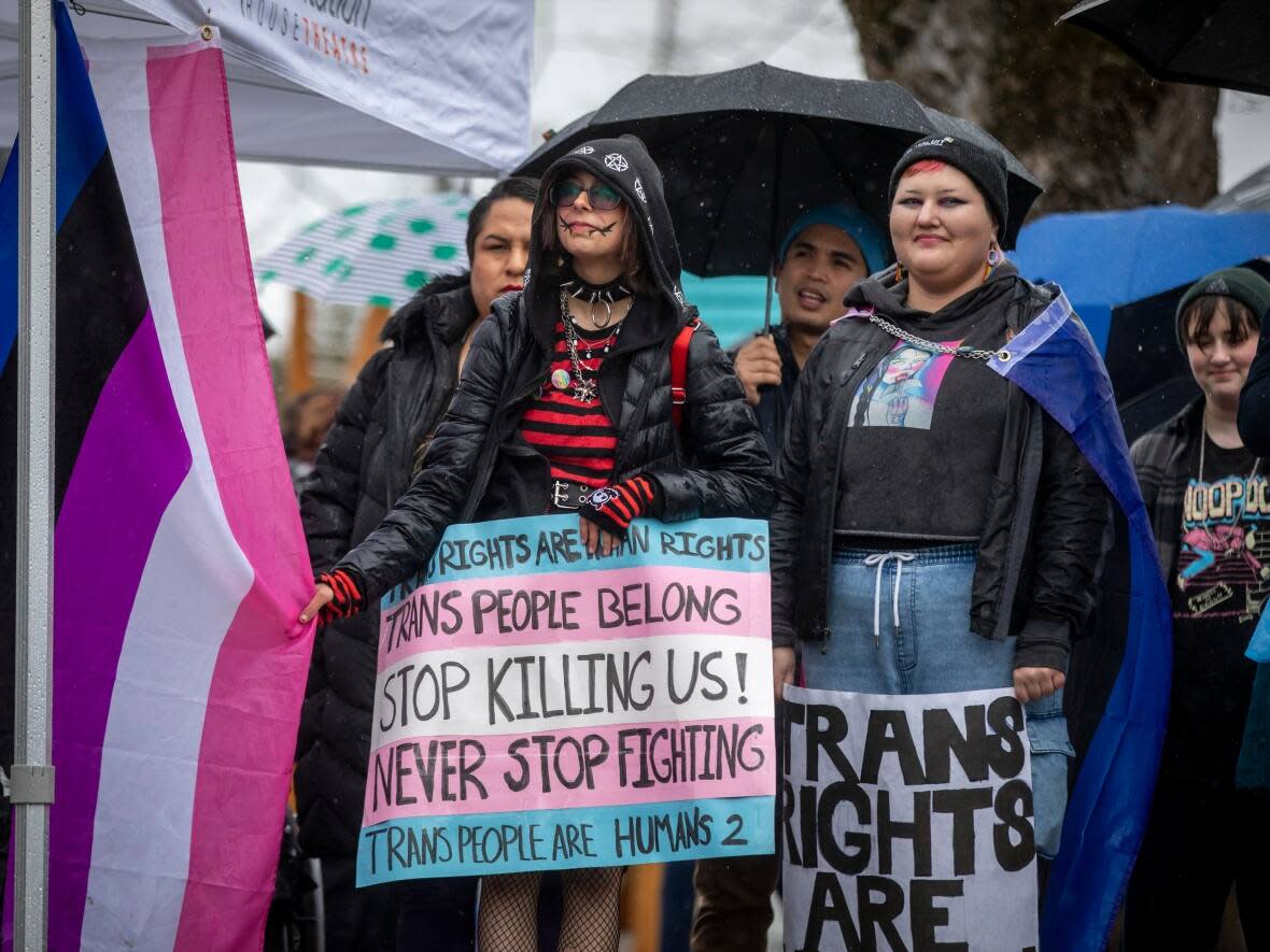 Members of the trans community are pictured during an event marking the International Trans Day of Visibility in Vancouver on Friday, March 31.  (Ben Nelms/CBC - image credit)