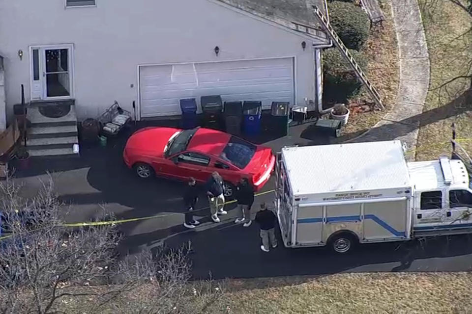 Police investigate the scene of a double homicide in Abington Township, Pa., on Wednesday. (NBC Philadelphia)
