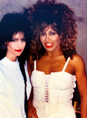 Holly Knight backstage with Tina Turner in Germany, 1985, after Turner teased the hit songwriter's hair.