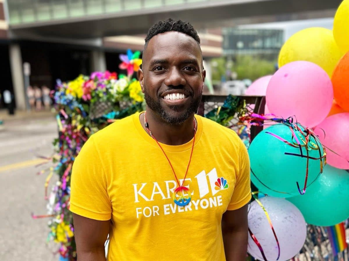 News anchor Jason Hackett poses at a Pride parade in Minneapolis, Minnesota (@jasonhackettnews/Instagram) (Instagram)