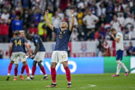 France's Kylian Mbappe celebrates his team victory over England at the end of the World Cup quarterfinal soccer match between England and France, at the Al Bayt Stadium in Al Khor, Qatar, Sunday, Dec. 11, 2022. (AP Photo/Christophe Ena)