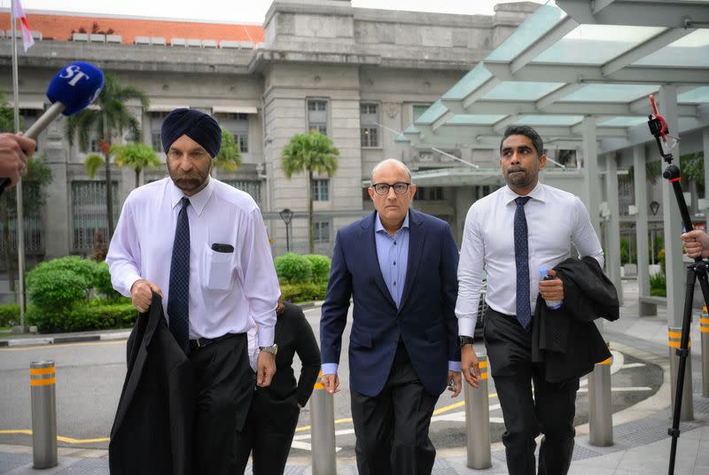 S. Iswaran, Singapore's former transport minister, arrives at the State Courts with his legal team in Singapore