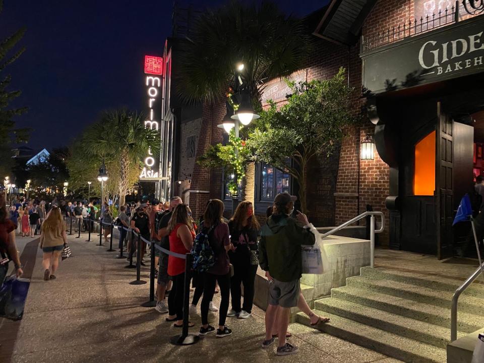 Gideon's Bakehouse in Disney Springs at night.