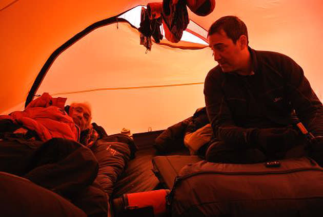 Dale (L) and Diego taking a rest in their tent.
