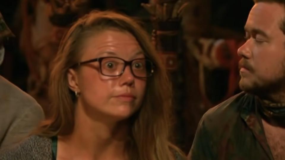 Jessica Lewis looking surprised at Tribal Council before going to rocks.