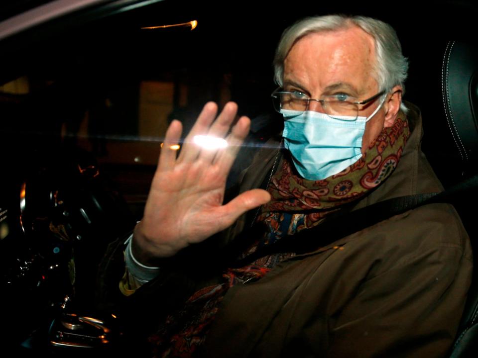 <p>EU chief negotiator Michel Barnier wearing a protective face covering to combat the spread of the coronavirus</p> (Hollie Adams/AFP via Getty Images)