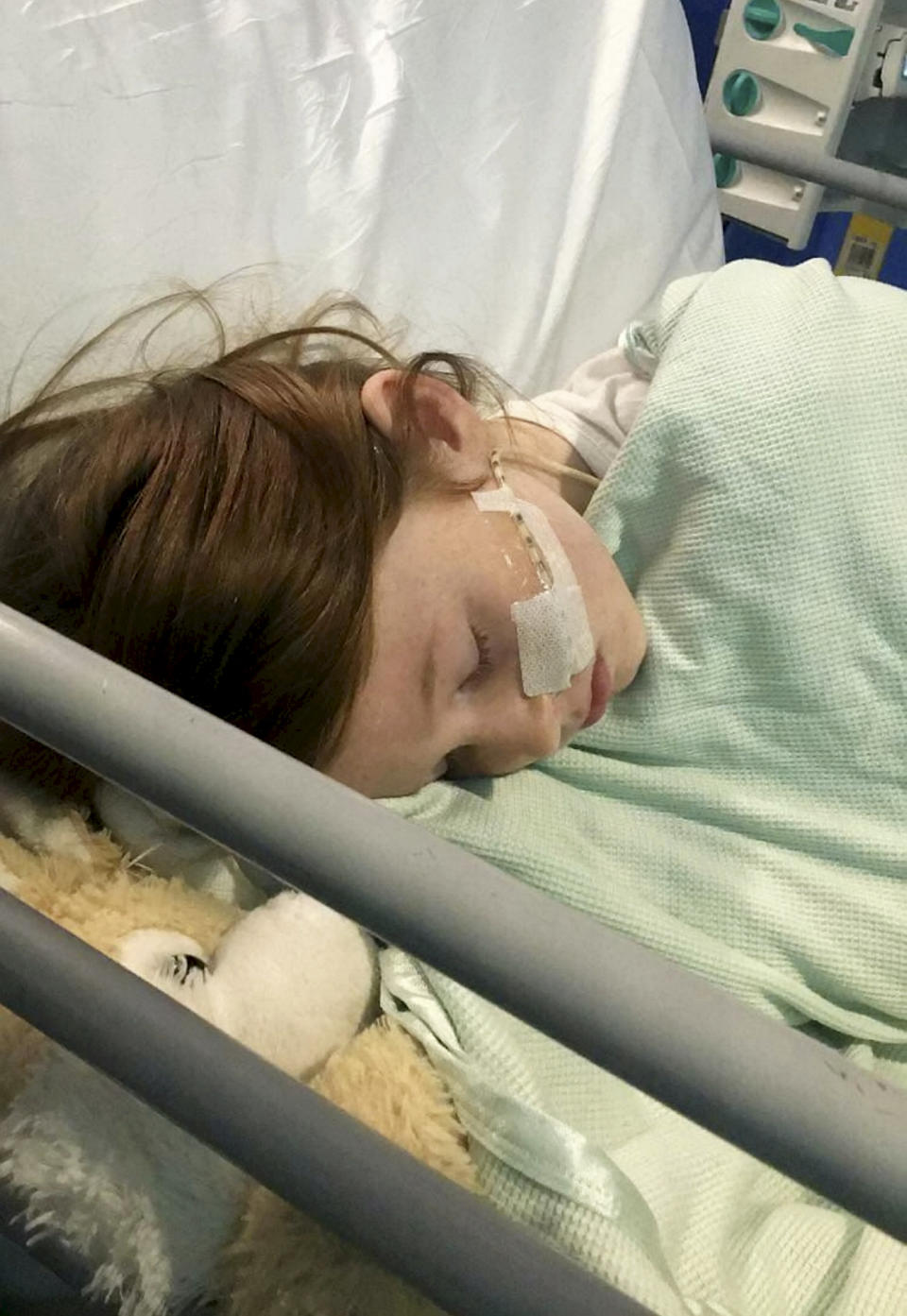 Gracie underwent a three hour operation to remove a blood clot from her brain. [Photo: SWNS]