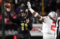 Oct 20, 2018; West Lafayette, IN, USA; Purdue Boilermakers quarterback David Blough (11) drops back to pass in the first half against the Ohio State Buckeyes at Ross-Ade Stadium. Mandatory Credit: Thomas J. Russo-USA TODAY Sports