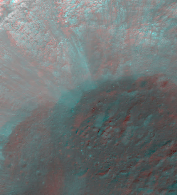 This view of the moon shows the vast Janssen K crater in 3D as seen by NASA's Lunar Reconnaissance Orbiter. It is a roughly 12-kilometer-diameter crater on the floor of the large Janssen Crater. Several debris flows can be seen running down the