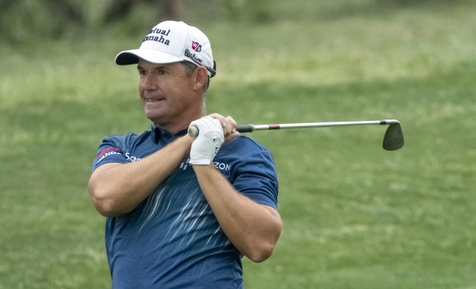 Padraig Harrington, Ireland, watches his fairway shot on the number eleven hole during the first round of the Valero Texas Open golf tournament, Thursday, March 30, 2023, in San Antonio. (AP Photo/Rodolfo Gonzalez )