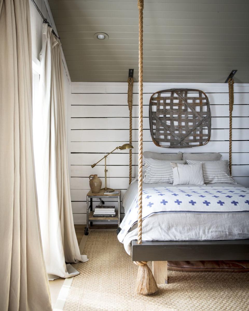 bed swing in white planked bedroom