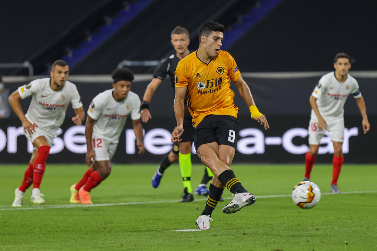 11 August 2020, North Rhine-Westphalia, Duisburg: Football: Europa League, Wolverhampton Wanderers - FC Sevilla, Final-Eight, quarter-finals at the Schauinsland-Reisen-Arena. Wolverhamptons Raul Jimenez takes a penalty after a foul on Wolverhamptons Traore. Photo: Rolf Vennenbernd/dpa (Photo by Rolf Vennenbernd/picture alliance via Getty Images)