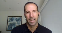 This still image from video shows New York Mets General Manager Billy Eppler during a news conference, Wednesday, Dec. 1, 2021. The Mets and three-time Cy Young Award winner Scherzer finalized a $130 million, three-year deal Wednesday, a contract that shattered baseball's record for highest average salary and forms a historically impressive 1-2 atop New York's rotation with Jacob deGrom. (New York Mets via AP)