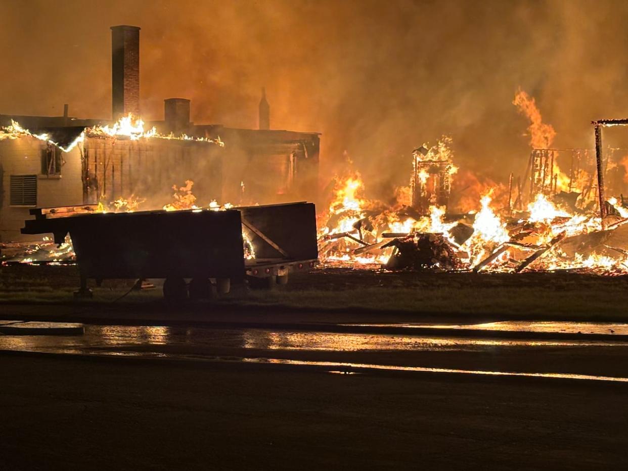 Flames engulf St. Jude's Anglican Church in Greenwood, B.C. (submitted by John Bolt - image credit)