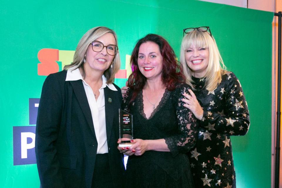 Emily Hodgkins receiving her award <i>(Image: Starlight)</i>