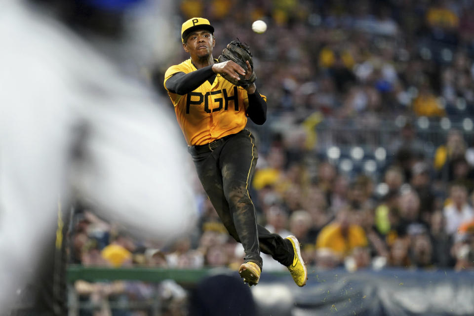 Pittsburgh Pirates third baseman Ke'Bryan Hayes throws to first on an infield single by Chicago Cubs' Seiya Suzuki during the fifth inning of a baseball game in Pittsburgh, Friday, Aug. 25, 2023. (AP Photo/Matt Freed)
