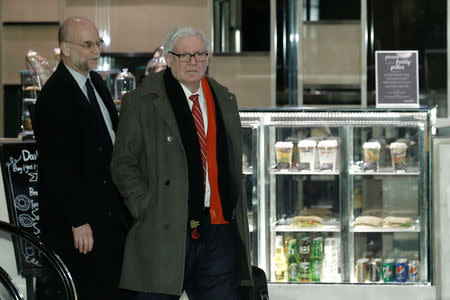 U.S. trade delegation member Under Secretary of Commerce for International Trade Gilbert Kaplan (R) arrives at a hotel after talks with Chinese officials in Beijing, China, February 11, 2019. REUTERS/Thomas Peter