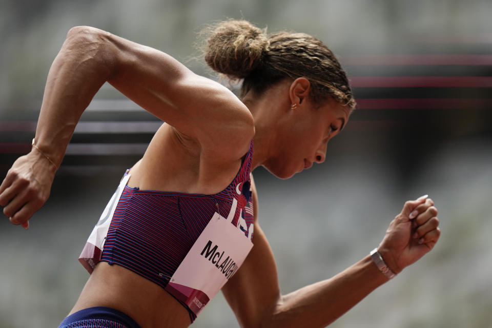 Sydney Mclaughlin, of United States, wins a heat in the women's 400-meter hurdles at the 2020 Summer Olympics, Saturday, July 31, 2021, in Tokyo. (AP Photo/Petr David Josek)