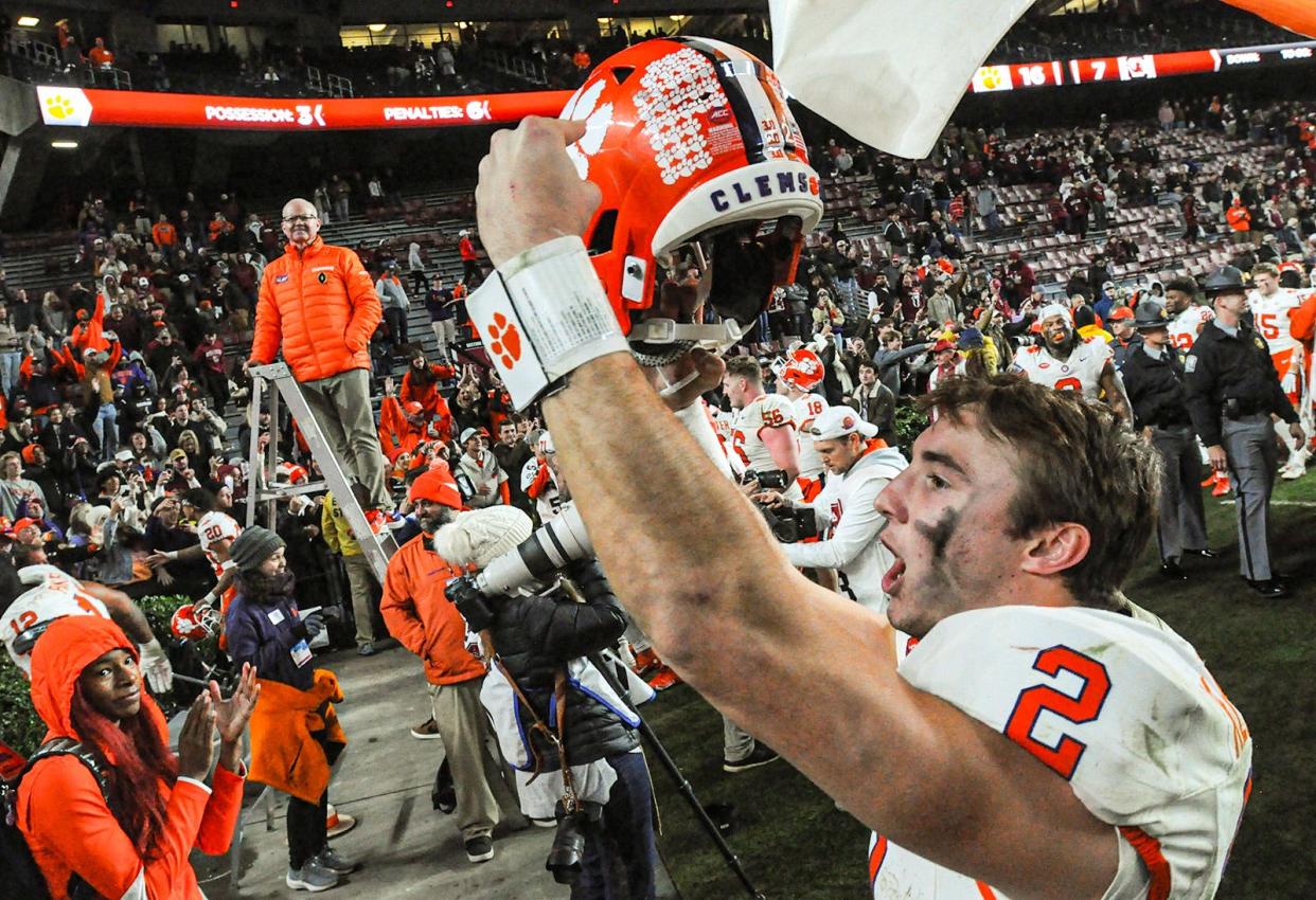 Clemson quarterback Cade Klubnik points to the Clemson logo on his helmet after the Tigers' 16-7 win over South Carolina on Nov. 25. The former Westlake star threw for 2,580 yards and 19 touchdowns this season.