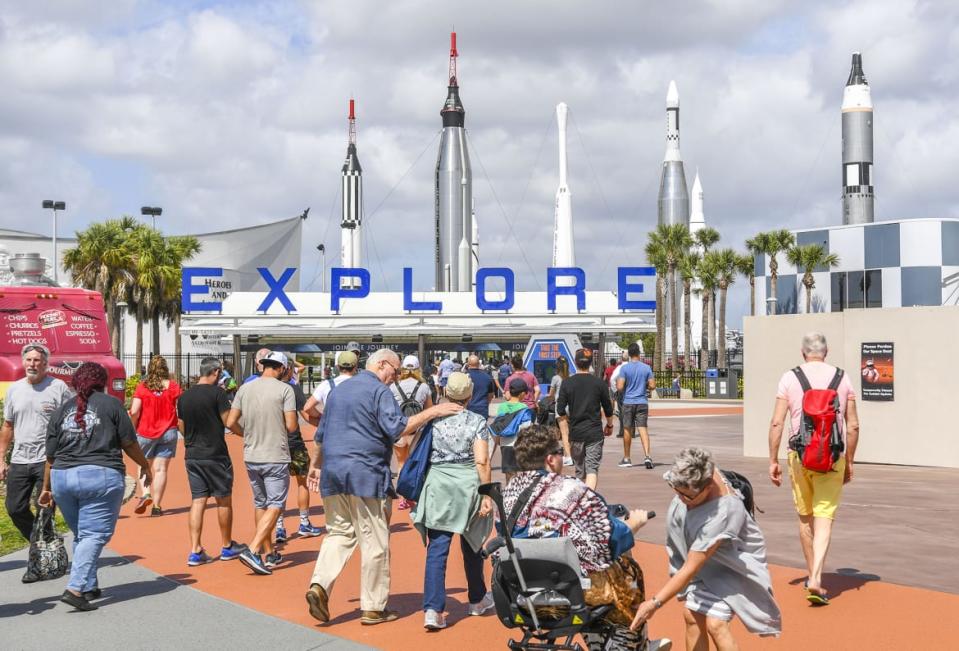 <div class="inline-image__caption"><p>People arrive to tour The Kennedy Space Center Visitors Complex which draws nearly two million visitors per year to the Space Coast.</p></div> <div class="inline-image__credit">Jonathan Newton/The Washington Post via Getty Images</div>