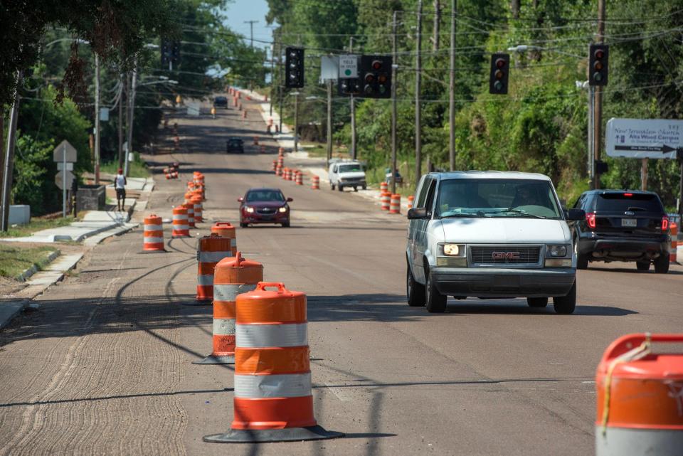 Construction barrels and cones dot the roads of Jackson on Friday. Street repair falls under the watch of the public works director, the highest paid position in Jackson.