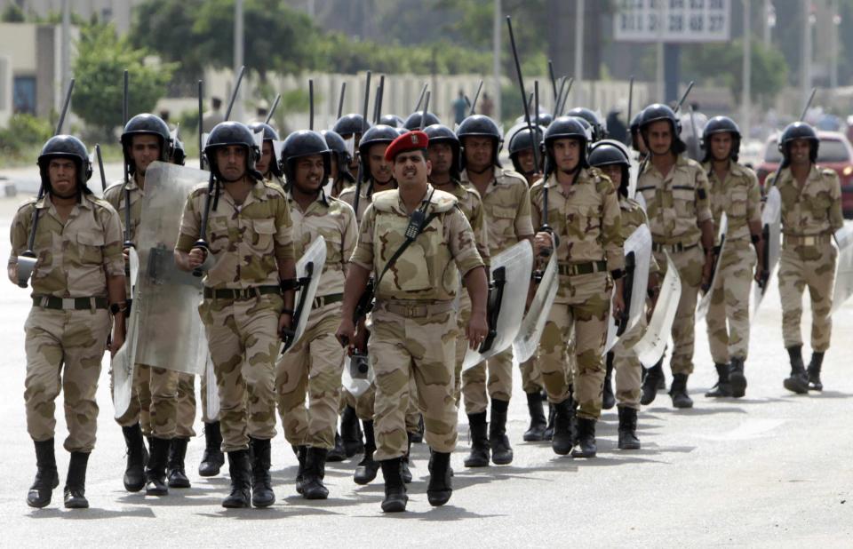 Egypt police storm area near Cairo