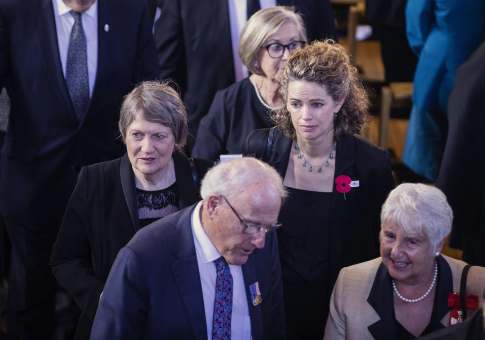 Former Prime Minister Helen Clark, left, with British High Commissioner to New Zealand Laura Clarke, center right, attend a national memorial service for Prince Philip at the Cathedral of St. Paul in Wellington, New Zealand. Prince Philip was remembered as frank, engaging and willing to meet people from all walks of life during his 14 visits to the country. (Robert Kitchin/Pool via AP)