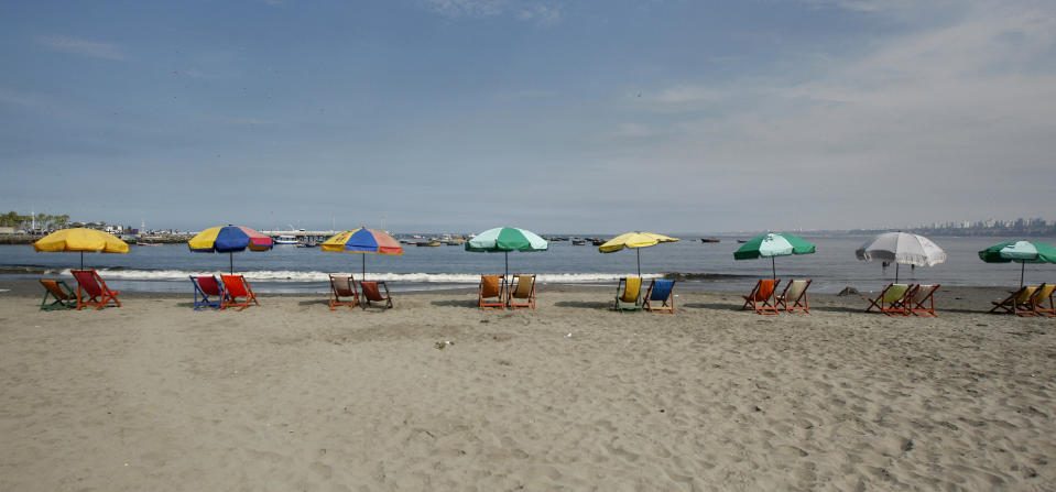 FILE - This March 11, 2011 file photo shows beach chairs along Agua Dulce beach in Lima, Peru. There are plenty of things to do and see around Lima for free, from parks to plazas, starting with the Pacific Ocean. (AP Photo/Karel Navarro)