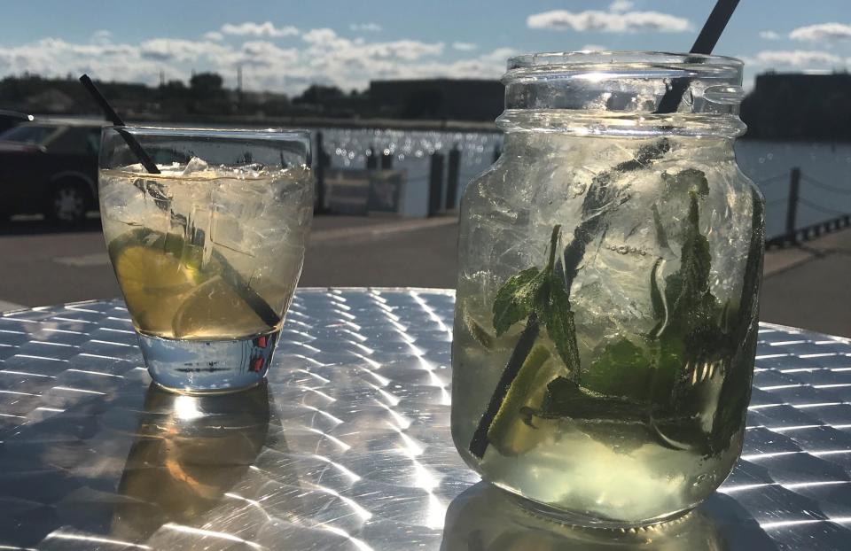 A mojito is a go-to summer cocktail made with rum, simple syrup, mint and club soda.