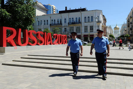 FILE PHOTO: Cossacks patrol a street ahead of the upcoming 2018 FIFA World Cup in Rostov-on-Don, Russia June 7, 2018. REUTERS/Sergey Pivovarov/File Photo