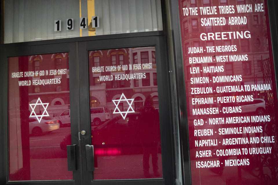 The front door of the world headquarters of the Israelite Church of God in Jesus Christ is seen, Thursday, Dec. 12, 2019, in the Harlem neighborhood of New York. (AP Photo/Mary Altaffer)