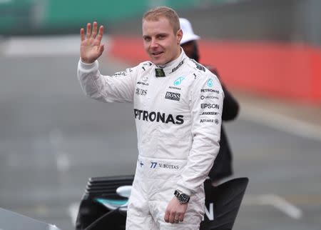 Britain Formula One - F1 - 2017 Mercedes Formula One Car Launch - Silverstone - 23/2/17 Mercedes' Valtteri Bottas poses during the launch Reuters / Eddie Keogh Livepic