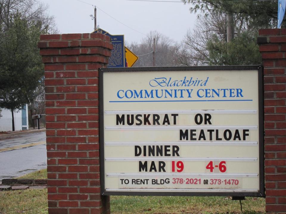 A 2016 sign outside of the Blackbird Community Center advertised its muskrat or meatloaf dinner.