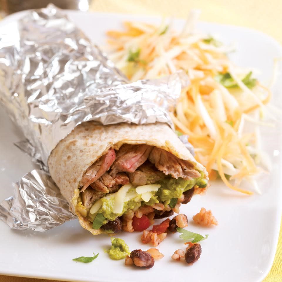 <p>Here's a burrito inspired by San Francisco's super burritos that come packed with meat, beans, rice, cheese, guacamole and salsa. We've kept this home-style version a bit simpler to make and a whole lot healthier with brown rice, whole-wheat tortillas and a more reasonable serving size. We recommend wrapping it in foil--the traditional way to serve it--so you can pick the burrito up and eat it without it falling apart, peeling back the foil as you go. Serve with a cold beer and vinegar-dressed slaw. <a href="https://www.eatingwell.com/recipe/252384/steak-burritos/" rel="nofollow noopener" target="_blank" data-ylk="slk:View Recipe;elm:context_link;itc:0;sec:content-canvas" class="link ">View Recipe</a></p>