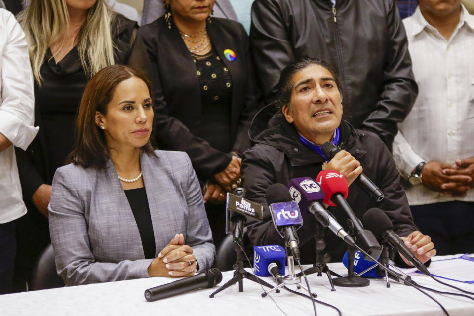 Yaku Perez, presidential candidate for the "Claro Que Se Puede" alliance, consisting of the Socialist Party, Popular Unity and Democracy parties, right, and his running mate Nory Pinela hold a press conference regarding the assassination of presidential candidate Fernando Villavicencio in Quito, Ecuador, Thursday, Aug. 10, 2023. The 59-year-old was fatally shot at a political rally on Aug. 9 in Quito. (AP Photo/Carlos Noriega)