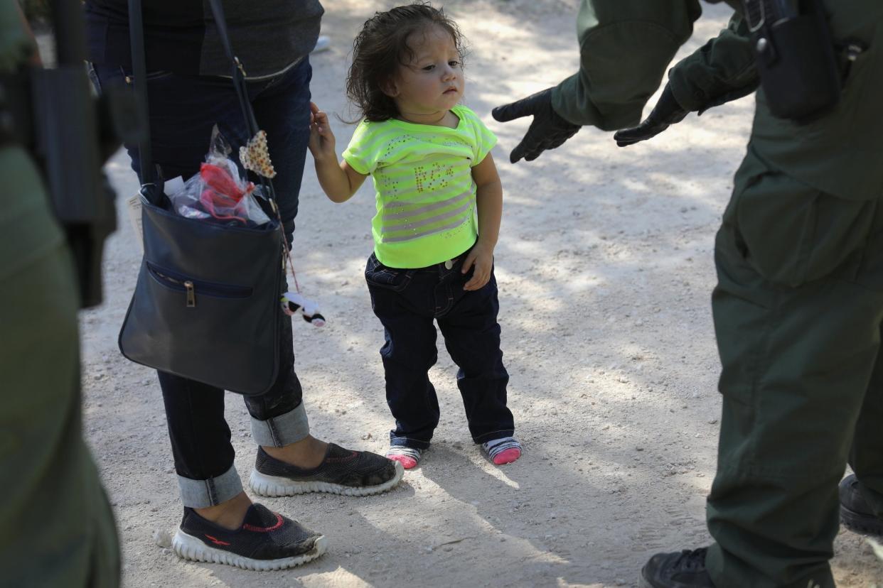 US Border Patrol agents take Central American asylum seekers into custody: Getty Images