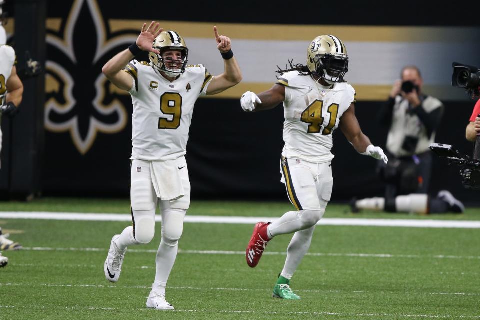 New Orleans Saints quarterback Drew Brees (9) gestures after running back Alvin Kamara (41) scored his sixth touchdown of the game in the fourth quarter against the Minnesota Vikings at the Mercedes-Benz Superdome on Dec 25, 2020.