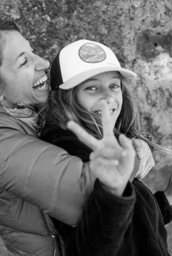 <span class="article__caption">Carrie Cooper and a fave bouldering buddy.</span>