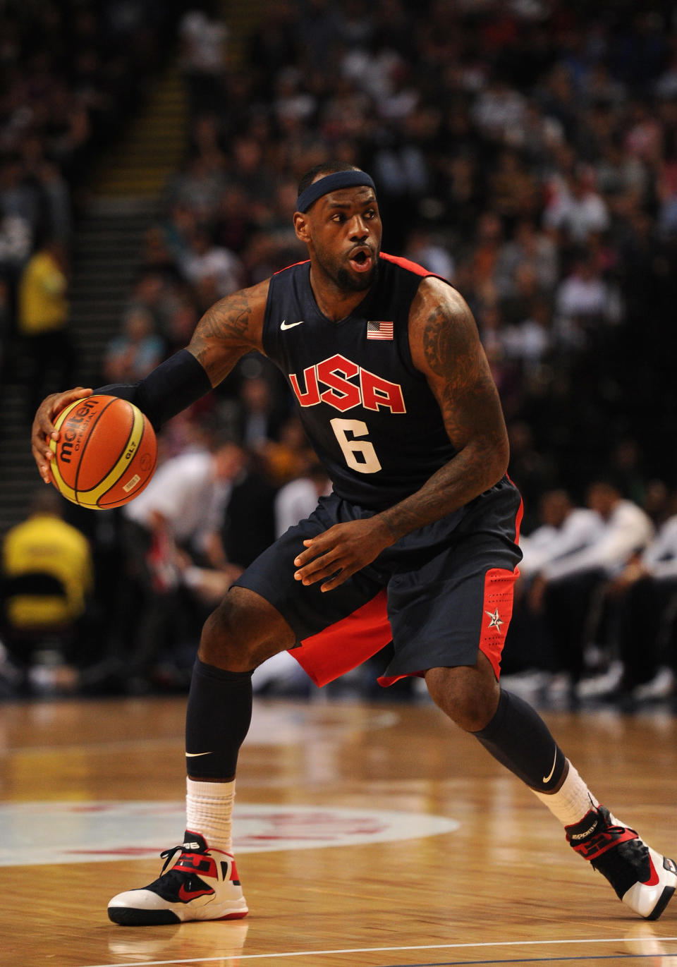 MANCHESTER, ENGLAND - JULY 19: USA player Lebron James in action during the Men's Exhibition Game between USA and Team GB at Manchester Arena on July 19, 2012 in Manchester, England.