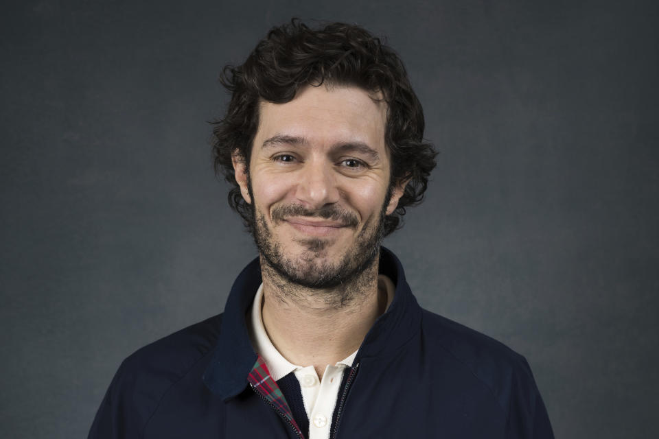 Adam Brody poses for a portrait to promote the film "Shazam! Fury of the Gods" at The London Hotel in West Hollywood, Calif., on Monday, Feb. 27, 2023. (Photo by Willy Sanjuan/Invision/AP)