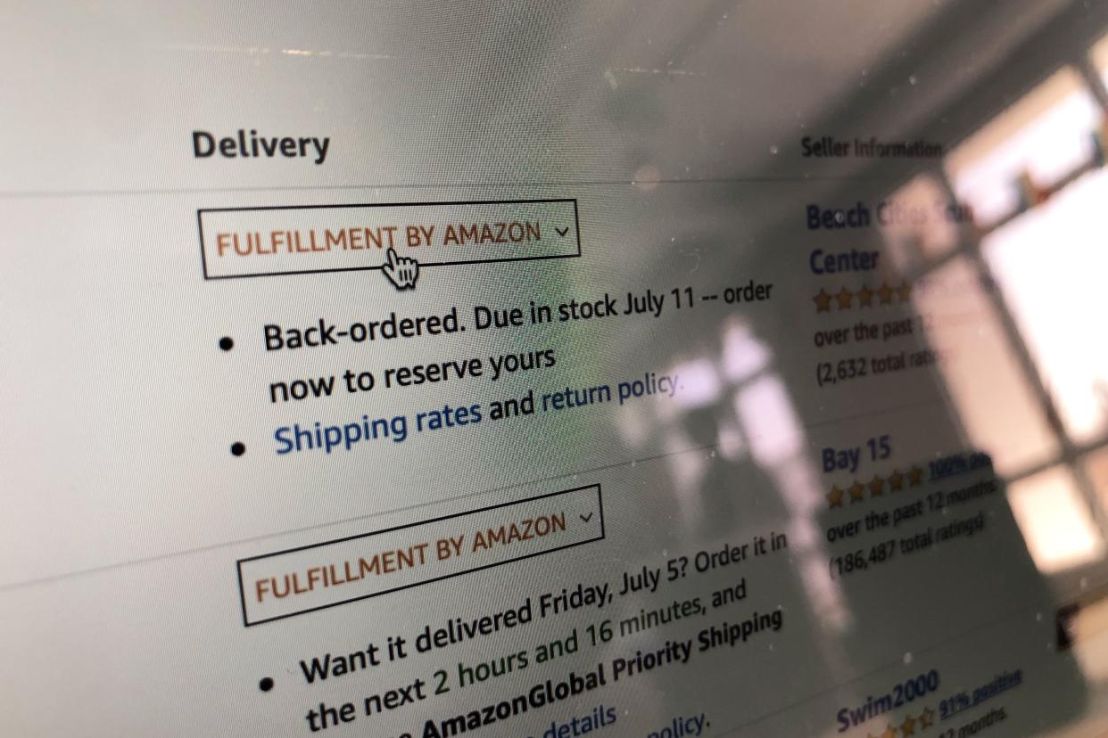 photo of screen, mouse clicking amazon fulfillment button