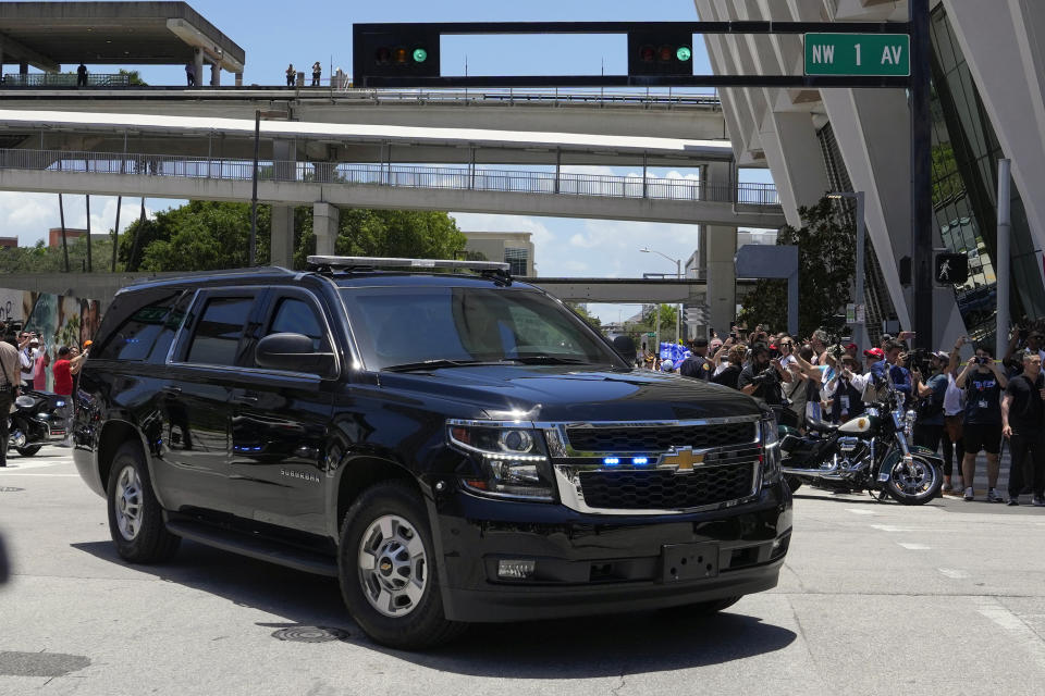 FILE - Former President Donald Trump arrives at the Wilkie D. Ferguson Jr. U.S. Courthouse, Tuesday, June 13, 2023, in Miami. A month after Trump was charged with mishandling classified documents, the judge presiding over the case is set to take on a more visible role as she weighs competing requests on a trial date and hears arguments this week on a key area of law. A pretrial conference Tuesday, July 18, to discuss procedures for handling classified information will represent the first courtroom arguments in the case before U.S. District Judge Aileen Cannon since Trump was indicted five weeks ago. (AP Photo/Lynne Sladky, File)